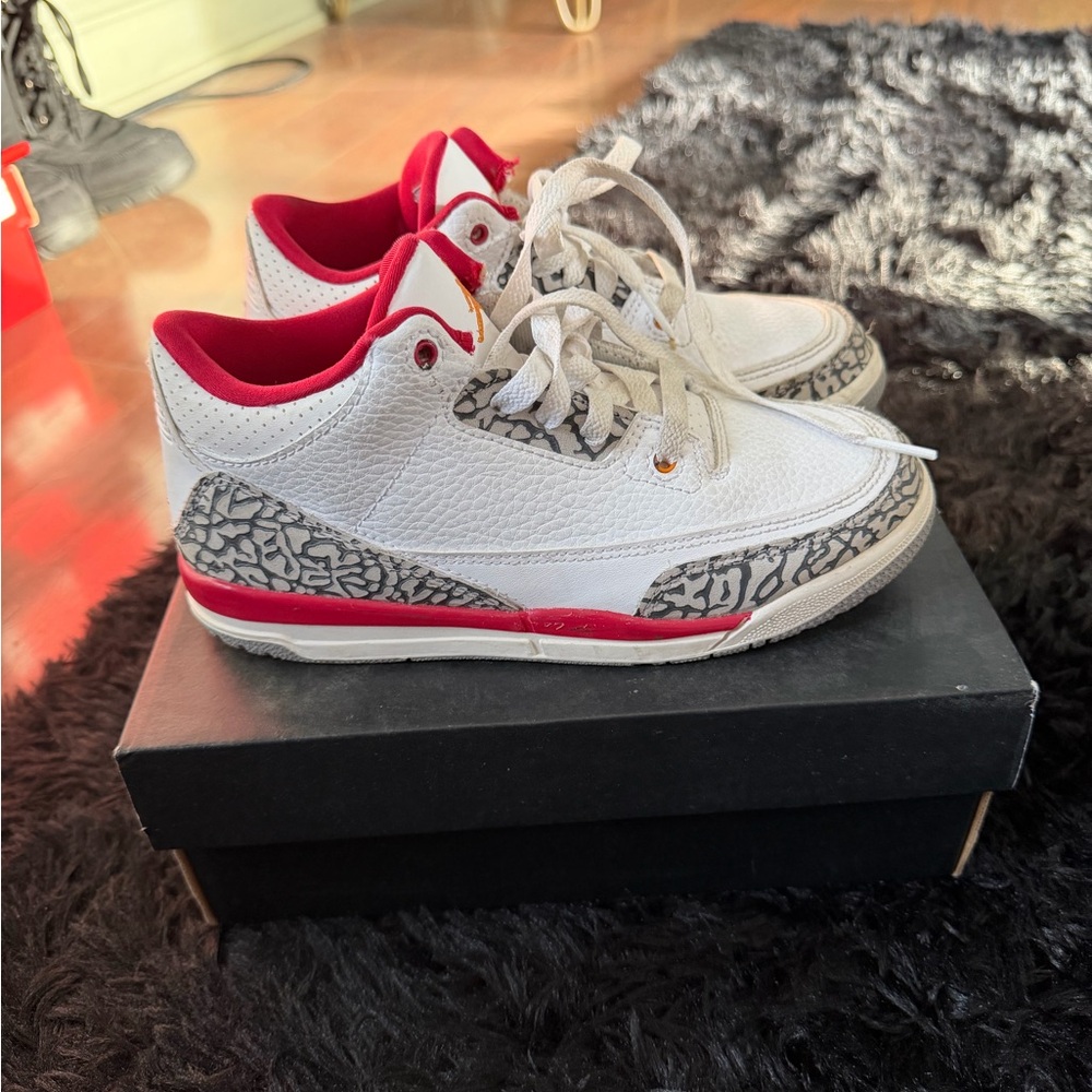 White and Red Sneakers with Patterned Accents
